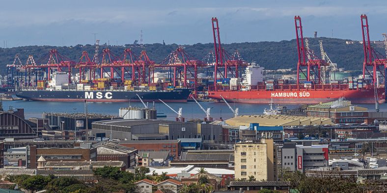 Early-morning panorama of the Port of Durban with container cranes