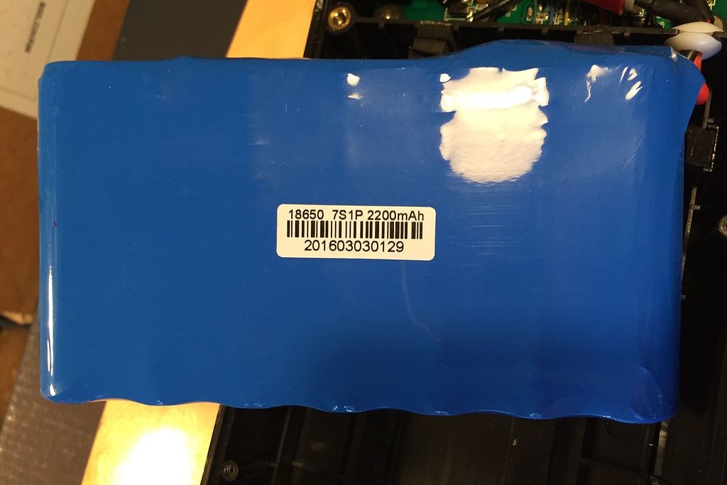 A shrink-wrapped lithium-ion battery pack for a small electric vehicle