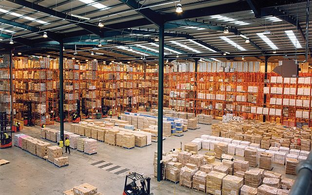 Warehouse interior with pallet racking and palletised cartons